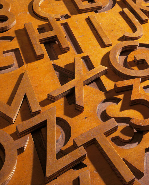 Detail of a wooden child's alphabet designed by Erno Goldfinger on display in the Nursery at 2 Willow Road